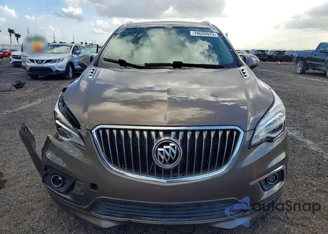 2018 Buick Envision Essence z USA, uszkodzony, nr VIN LRBFX1SA8JD007918